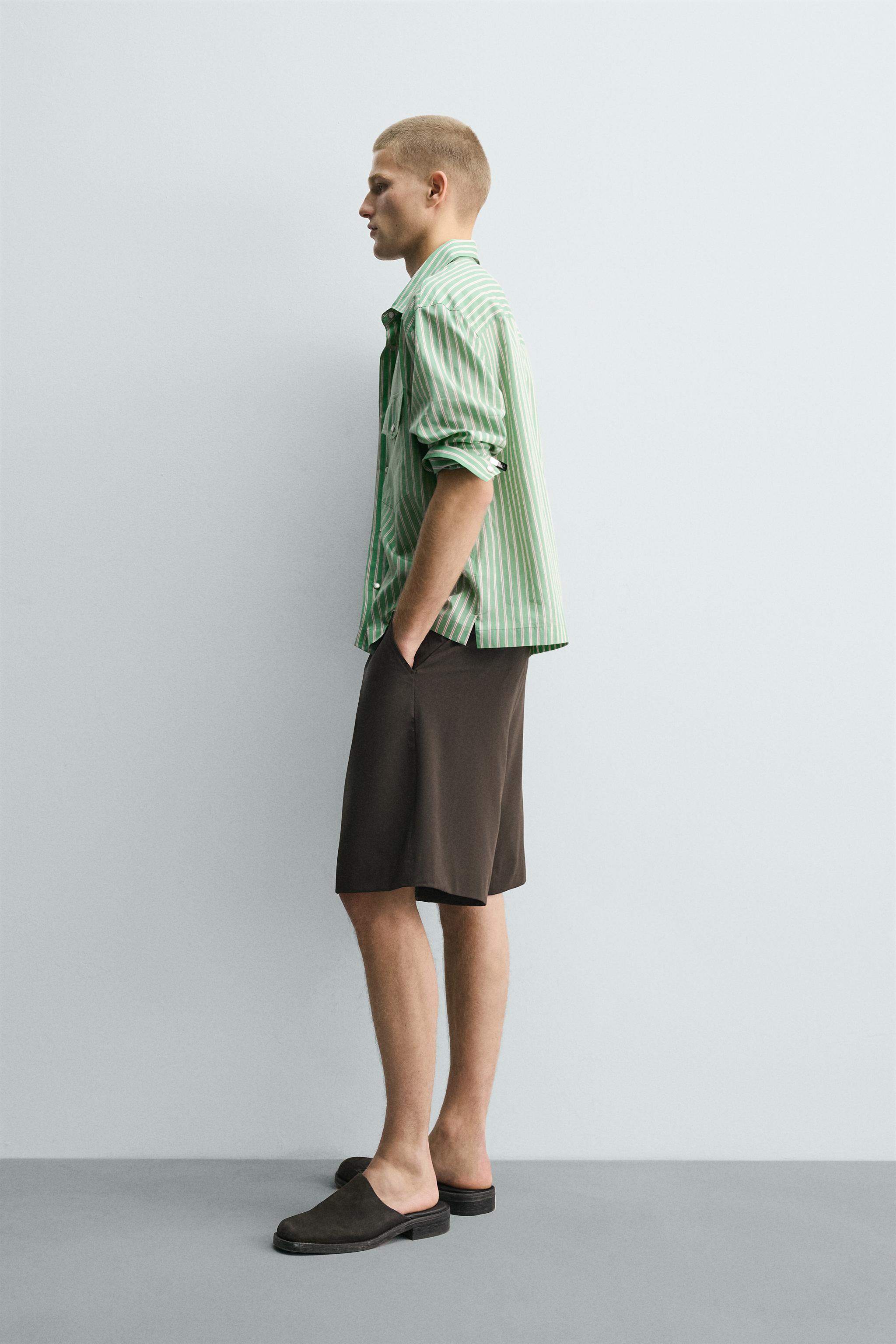 RELAXED FIT PLEATED SHORTS